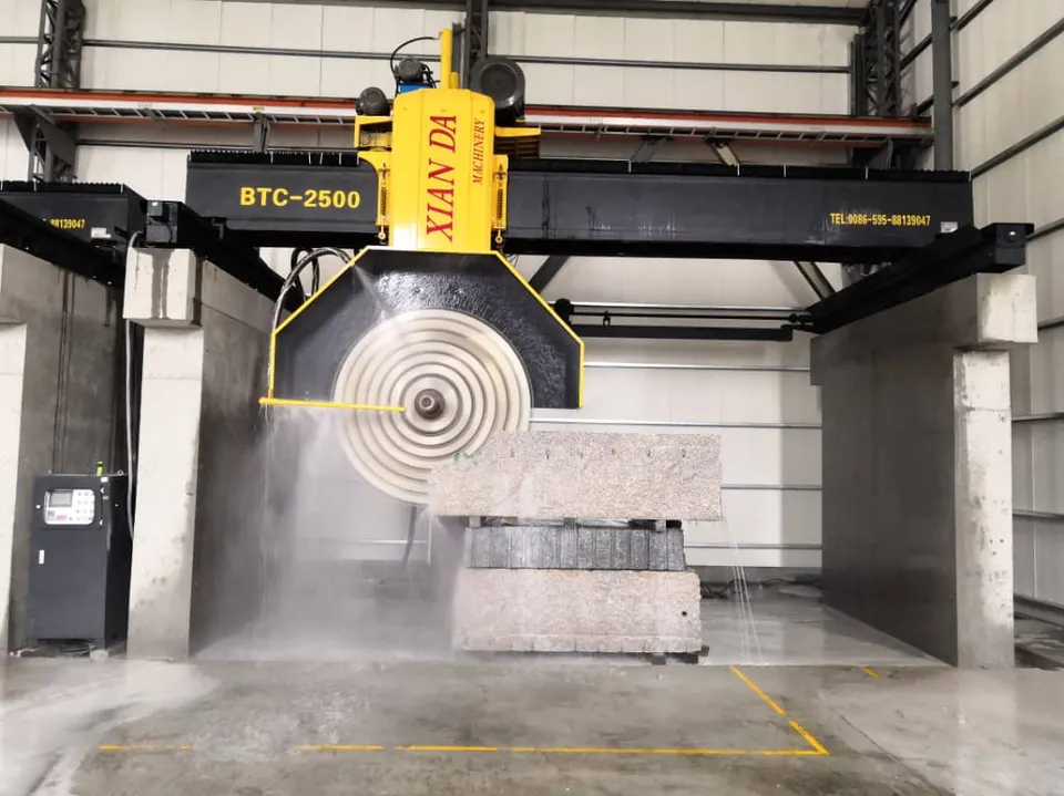 Photograph of a bridge saw cutting a block of stone