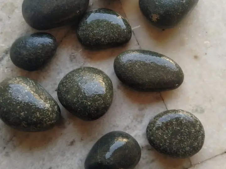 Example photograph of Black river pebbles